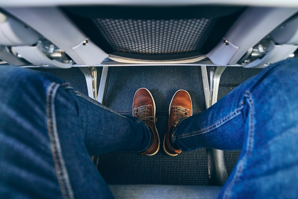 Women Have Had It With 'ManSpreading' On Flights As Man's Sitting Position Goes Viral