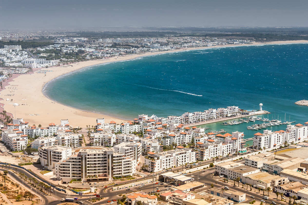 Aerial View Of A Development Zone In Agadir, A Coastal Resort In Morocco, North Africa, Facing The Azure Atlantic Ocean